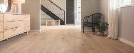 Light wood flooring in a modern home hallway and living space | Westport Flooring and Interiors